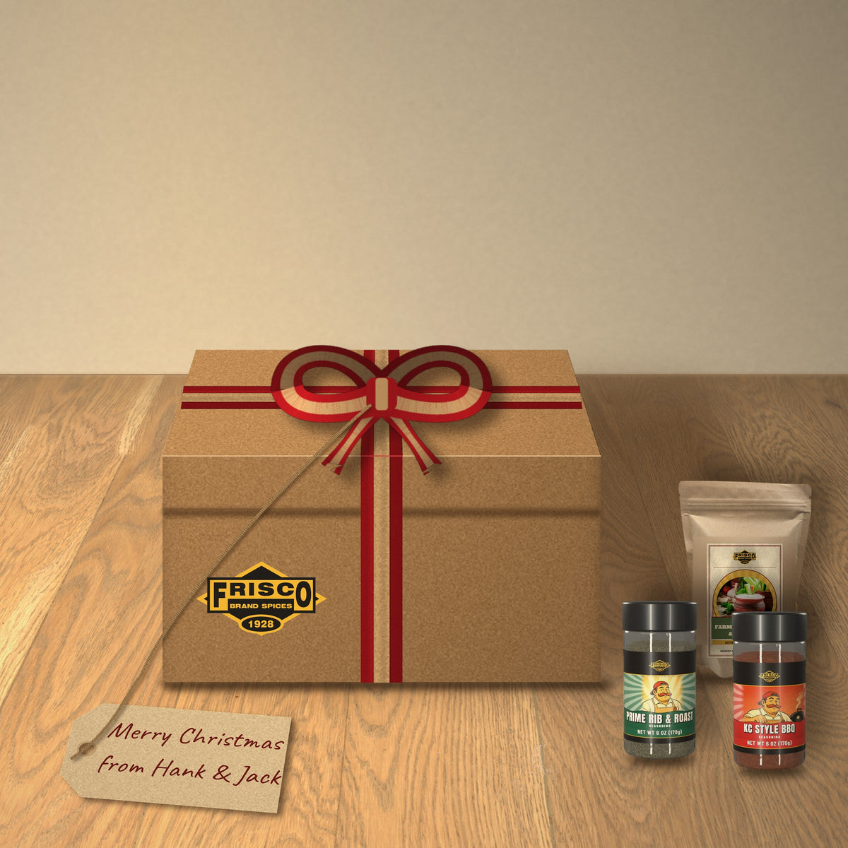 Hank's Grill Starter Gift Box: tied with a red and kraft ribbon on a wood table, with a 'Merry Christmas from Hank & Jack' tag