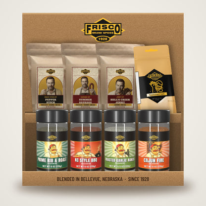 Hank & Jack Deer Camp Gift Box: Pepper Stick, Summer Sausage, Hell's Creek Jerky and Seasoned Salt bags with Prime Rib & Roast, KC Style BBQ, Roasted Garlic Ranch and Cajun Fire bottles in a Frisco kraft box