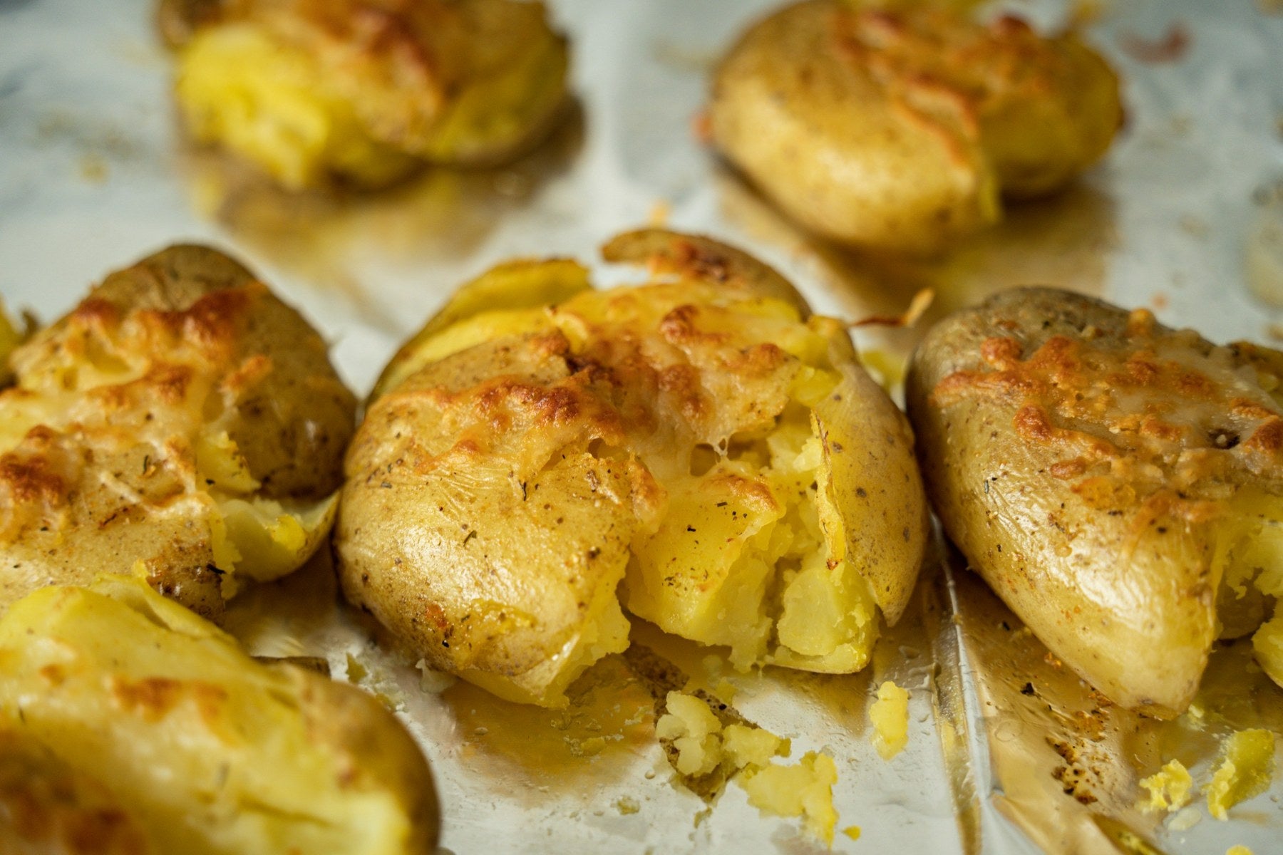Crispy smashed potatoes roasted golden on a sheet pan